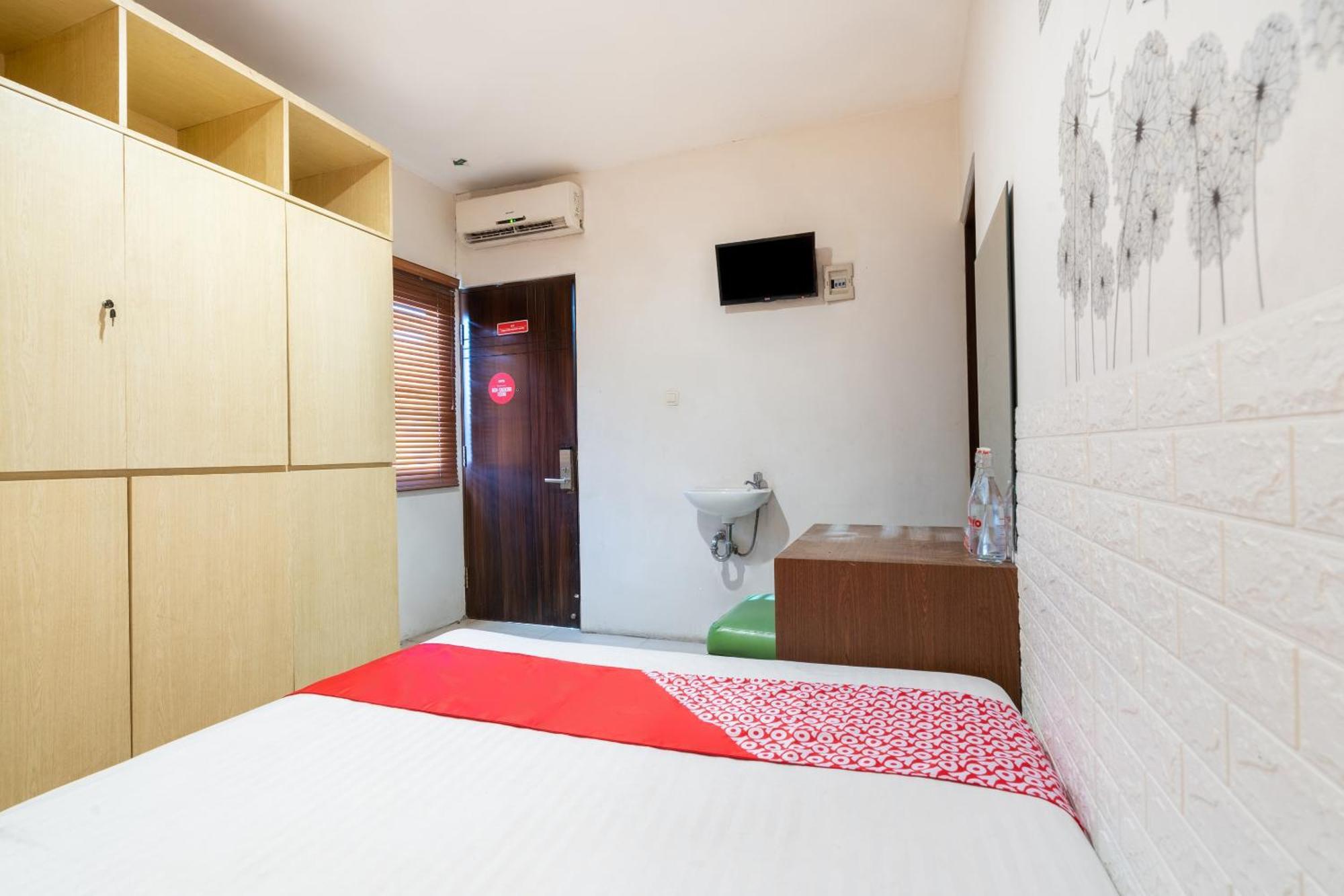 Super Oyo Flagship 91863 Metro House Hotell Surabaya Eksteriør bilde